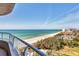 Breathtaking balcony view of the pristine beach and ocean, offering a serene coastal experience at 775 Longboat Club Rd # 902, Longboat Key, FL 34228