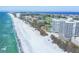 Stunning beachfront condo boasts pristine sands and turquoise waters, offering a luxurious coastal lifestyle at 775 Longboat Club Rd # 902, Longboat Key, FL 34228