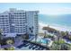 Elegant beachfront condo offers luxury living with a pool, private beach access, and spectacular ocean panoramas at 775 Longboat Club Rd # 902, Longboat Key, FL 34228