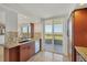 Bright and functional kitchen offers a view of the ocean, stainless steel appliances, and custom cabinets at 775 Longboat Club Rd # 902, Longboat Key, FL 34228