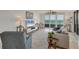Spacious living room with ocean views, contemporary furniture, and stylish accents at 775 Longboat Club Rd # 902, Longboat Key, FL 34228