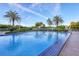 Community pool featuring clear blue water and refreshing surroundings at 775 Longboat Club Rd # 902, Longboat Key, FL 34228