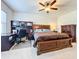 Main bedroom with king-size bed, built-in desk and dresser at 8267 Nandina Dr, Sarasota, FL 34240