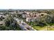 Aerial view of condo community with roads and landscaping at 8335 Glenrose Way # 1513, Sarasota, FL 34238