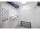 Walk-in closet with wire shelving and shoe rack at 8335 Glenrose Way # 1513, Sarasota, FL 34238