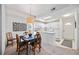 Bright dining area with table and chairs, adjacent to kitchen at 8335 Glenrose Way # 1513, Sarasota, FL 34238