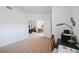 Home office with built-in desk and access to other rooms at 8335 Glenrose Way # 1513, Sarasota, FL 34238
