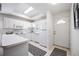 Bright kitchen with white cabinets and modern appliances at 8335 Glenrose Way # 1513, Sarasota, FL 34238