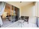 Screened patio with sliding doors opening to living room at 8335 Glenrose Way # 1513, Sarasota, FL 34238