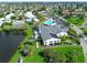 Aerial view of community clubhouse, pool, and surrounding landscape at 9413 Andover Cir, Bradenton, FL 34210