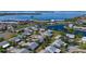 Aerial view of a waterfront community with a home highlighted at 9413 Andover Cir, Bradenton, FL 34210