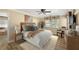 Cozy bedroom with a king-size bed and wood accents at 9413 Andover Cir, Bradenton, FL 34210