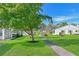 Peaceful community with tree-lined walking paths and lush landscaping at 9413 Andover Cir, Bradenton, FL 34210