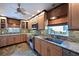 Bright kitchen featuring stainless steel appliances and granite counters at 9413 Andover Cir, Bradenton, FL 34210