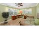 Bright home office with a built-in desk and daybed at 9413 Andover Cir, Bradenton, FL 34210