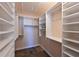 Large walk-in closet with ample shelving and hanging space at 9413 Andover Cir, Bradenton, FL 34210