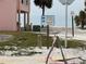 Sign marking beach access to Bradenton Beach, offering a gateway to sandy shores and coastal enjoyment at 2601 Gulf N Dr # 613, Bradenton Beach, FL 34217