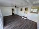 Bright sunroom featuring laminate floors, white walls, and natural light at 2601 Gulf N Dr # 613, Bradenton Beach, FL 34217