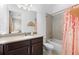 Cozy bathroom featuring a shower-tub combo and neutral color palette at 10120 Carnoustie Pl, Bradenton, FL 34211