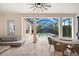 Relaxing outdoor patio area that overlooks the pool at 10120 Carnoustie Pl, Bradenton, FL 34211