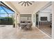 Outdoor dining area that overlooks the pool at 10120 Carnoustie Pl, Bradenton, FL 34211