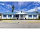 White and blue house with a metal roof at 10315 Cortez W Rd # 58-3, Bradenton, FL 34210