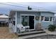 Updated beach cottage, nicely landscaped, with outdoor seating at 10315 Cortez W Rd # 58-3, Bradenton, FL 34210