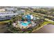 Aerial view of community pool and clubhouse at 10390 Longshore Rd # 83, Placida, FL 33946