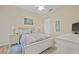 Bedroom with queen bed and built-in dresser at 10390 Longshore Rd # 83, Placida, FL 33946