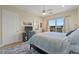 Main bedroom with king-size bed, TV, and access to balcony at 10390 Longshore Rd # 83, Placida, FL 33946