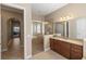 Elegant bathroom with a walk-in shower and double vanity at 110 Asti Ct, North Venice, FL 34275