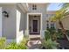 Inviting entryway with landscaping and brick walkway at 110 Asti Ct, North Venice, FL 34275