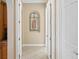 Bright hallway with tile flooring and arched detail at 110 Asti Ct, North Venice, FL 34275