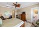 Main bedroom with private access to patio at 110 Asti Ct, North Venice, FL 34275