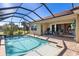 Spacious pool and patio with screened enclosure and access to the house at 110 Asti Ct, North Venice, FL 34275