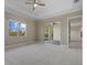 Bright bedroom with sliding glass doors to patio at 12029 Perennial Pl, Bradenton, FL 34211