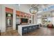 A modern clubhouse kitchen with stainless steel appliances and ample counter space at 12029 Perennial Pl, Lakewood Ranch, FL 34211