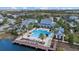 Resort-style community pool with sundeck and lake access at 12029 Perennial Pl, Bradenton, FL 34211