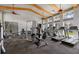 A well-equipped gym area with ample light and exercise machines at 12029 Perennial Pl, Lakewood Ranch, FL 34211