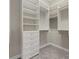 Large walk-in closet, built-in shelving and drawers at 12029 Perennial Pl, Bradenton, FL 34211