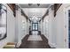 Bright and spacious hallway with elegant flooring at 12251 Myrtle Bay Ct, Sarasota, FL 34238