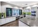 Community kitchen with modern appliances and green tile at 12251 Myrtle Bay Ct, Sarasota, FL 34238