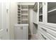 Large walk-in closet offering abundant storage solutions at 12251 Myrtle Bay Ct, Sarasota, FL 34238