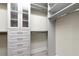 Spacious walk-in closet with ample shelving and drawer space at 12251 Myrtle Bay Ct, Sarasota, FL 34238