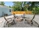 Backyard featuring a brick fire pit surrounded by gravel and seating, ideal for gatherings at 1259 39Th St, Sarasota, FL 34234