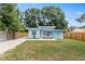 Charming front exterior of a well-maintained home with lush landscaping and a welcoming entrance at 1259 39Th St, Sarasota, FL 34234