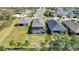 Aerial view of homes with backyard and screened lanai at 15305 Isla Palma Ln, Nokomis, FL 34275