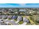 Aerial view of community with lake and ocean views at 15305 Isla Palma Ln, Nokomis, FL 34275