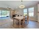 Light-filled dining area adjacent to the kitchen and Gathering room at 15305 Isla Palma Ln, Nokomis, FL 34275