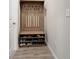 Inviting entryway with shoe storage bench at 15305 Isla Palma Ln, Nokomis, FL 34275